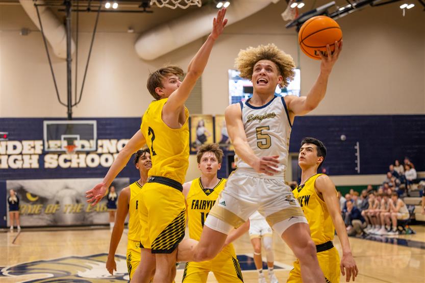 Students play basketball